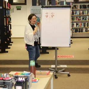 Kursleiterin vor Flipchart 