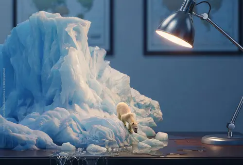 Auf einem Schreibtisch steht ein Eisberg mit einem Eisbär. Durch die Schreibtischlampe schmilzt das Eis. Titel Oberasbach macht's aus. Oben Logo WWF