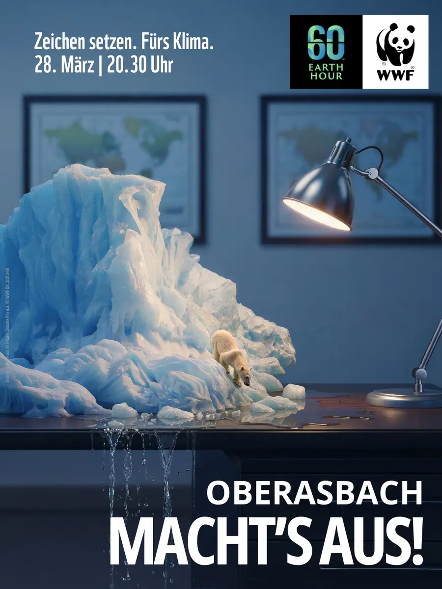 Auf einem Schreibtisch steht ein Eisberg mit einem Eisbär. Durch die Schreibtischlampe schmilzt das Eis. Titel Oberasbach macht's aus. Oben Logo WWF